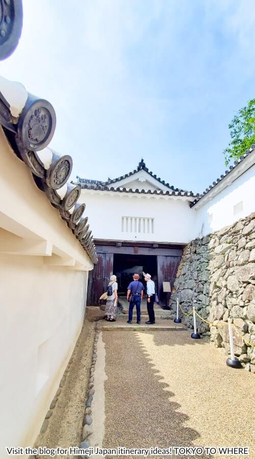 walking through himeji castle gate